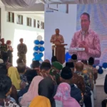 Direktur Sumber Daya Manusia dan Umum BPJS Kesehatan, Andi Afdal Abdullah, memberikan sambutan