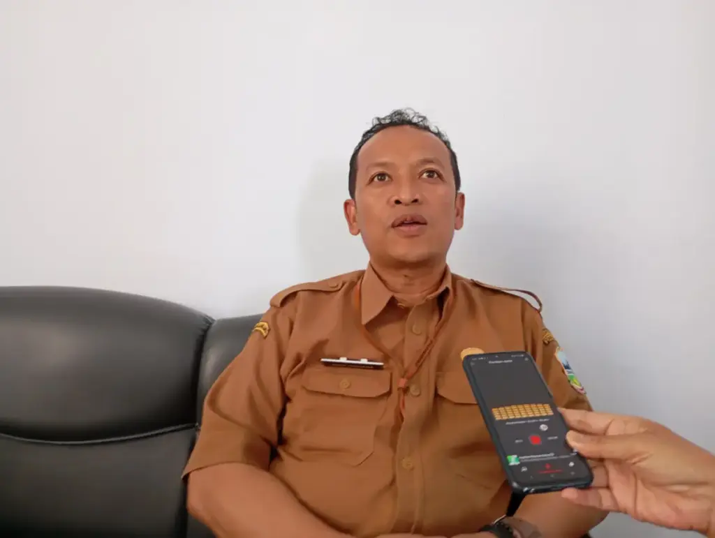 Kepala Bidang Hubungan Industrial dan Jamsostek Disnakertrans Garut, Asep Hadiana. (Foto: Ale/Radar Garut)